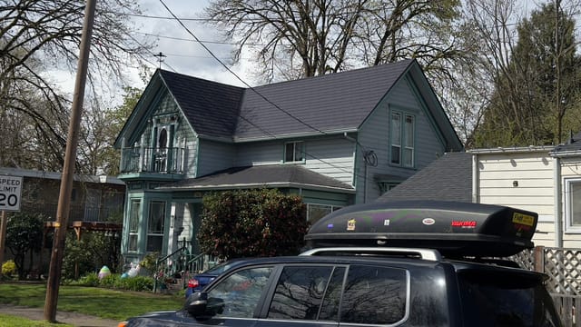 Black Interlock metal roof in Eugene, OR