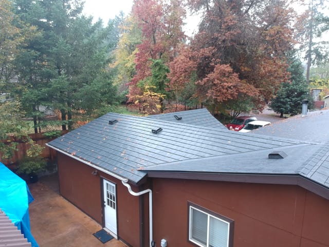 Black Interlock metal roof in Albany, OR
