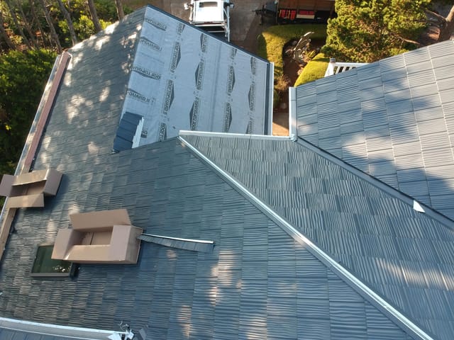 Deep Charcoal Interlock metal roof in Lincoln City, OR
