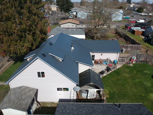 Deep Charcoal Interlock metal roof in Junction City, OR