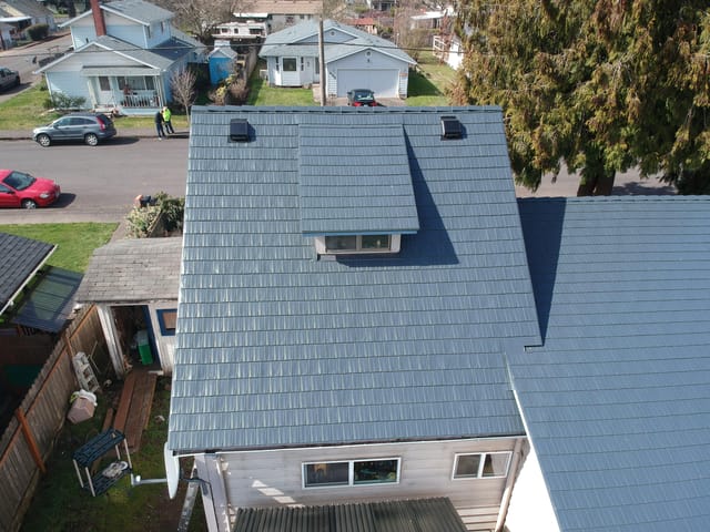 Deep Charcoal Interlock metal roof in Junction City, OR