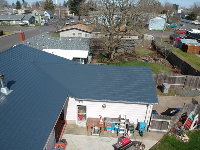 Deep Charcoal Interlock metal roof in Junction City, OR