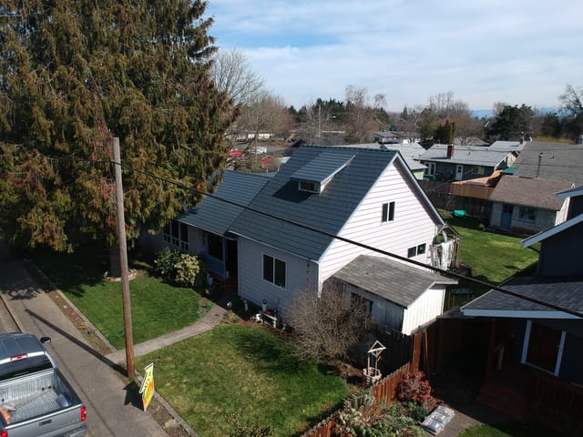 Deep Charcoal Interlock metal roof in Junction City, OR