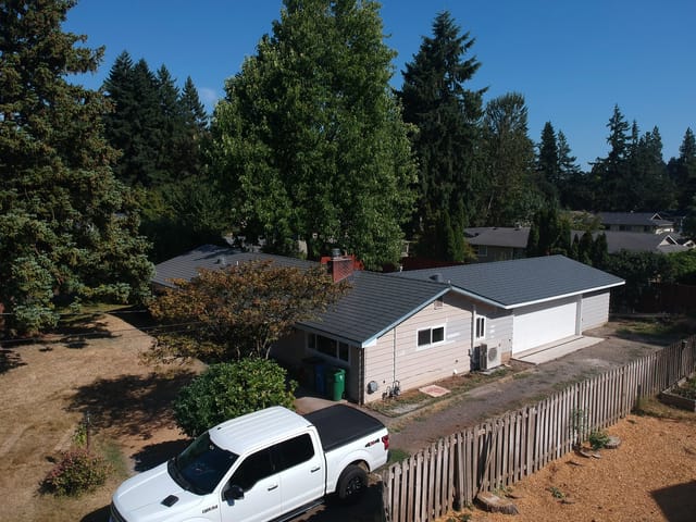 Deep Charcoal Interlock metal roof in Eugene, OR