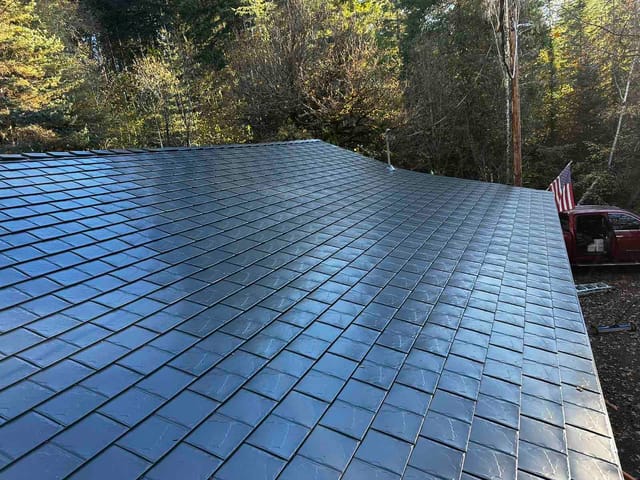 Black Interlock metal roof in Alsea, OR