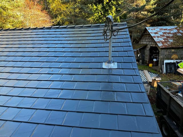 Black Interlock metal roof in Alsea, OR