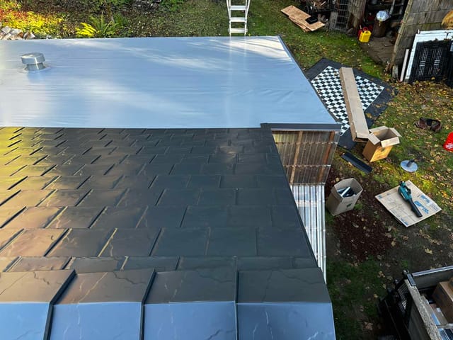 Black Interlock metal roof in Alsea, OR