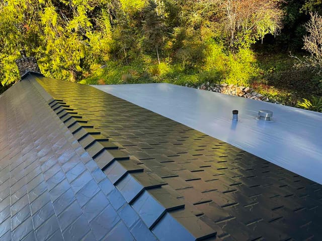 Black Interlock metal roof in Alsea, OR
