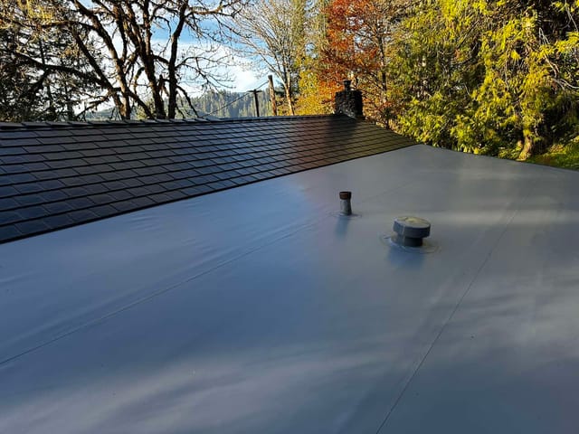 Black Interlock metal roof in Alsea, OR