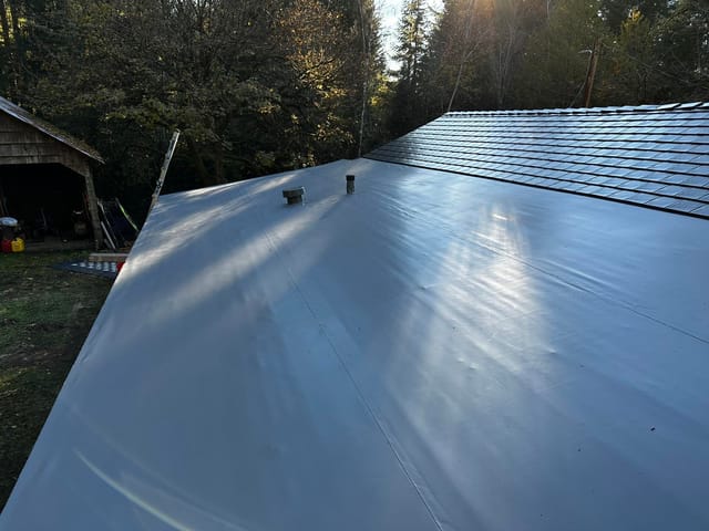 Black Interlock metal roof in Alsea, OR