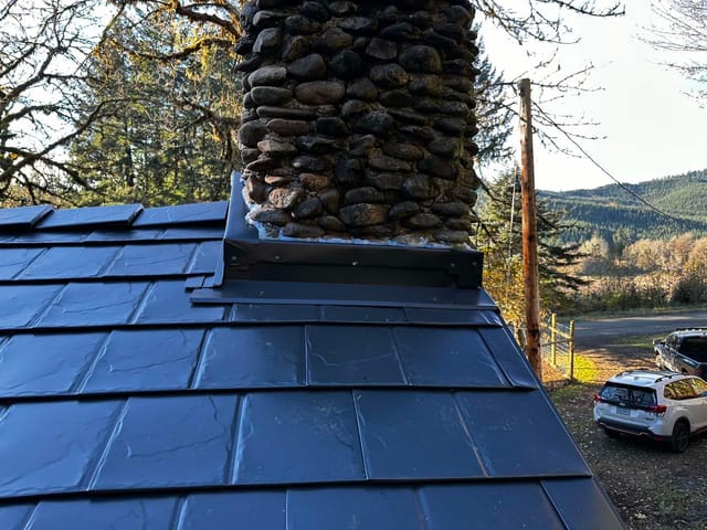 Black Interlock metal roof in Alsea, OR