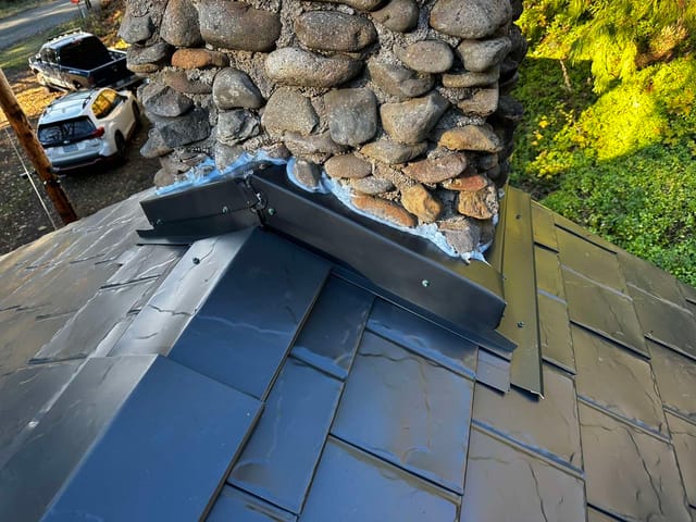 Black Interlock metal roof in Alsea, OR