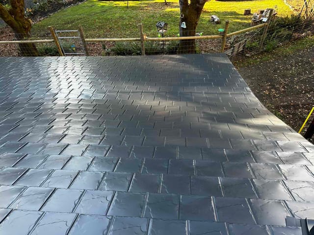 Black Interlock metal roof in Alsea, OR