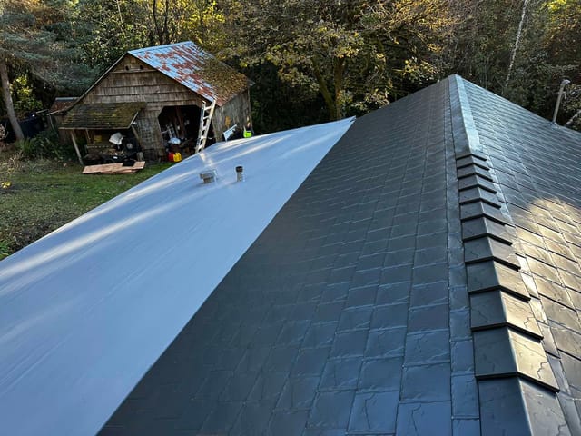 Black Interlock metal roof in Alsea, OR