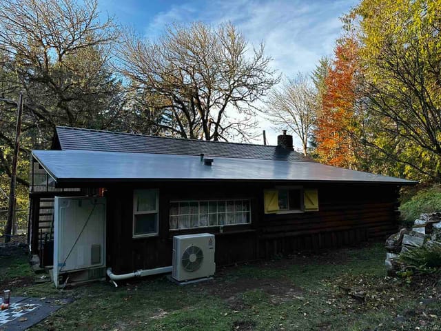 Black Interlock metal roof in Alsea, OR