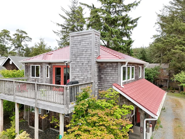 Tile Red Interlock metal roof in Manzanita, OR