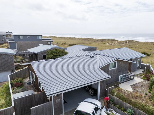 Black Interlock metal roof in Manzanita, OR