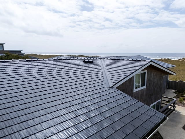 Black Interlock metal roof in Manzanita, OR