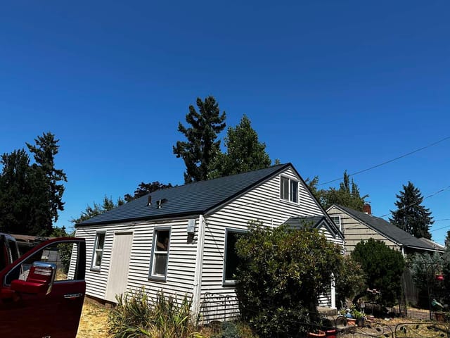 Deep Charcoal Interlock metal roof in Eugene, OR
