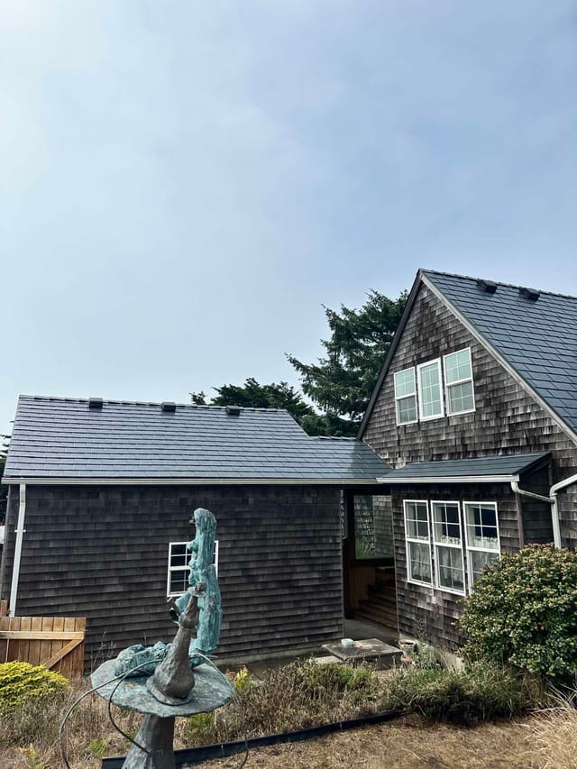 Deep Charcoal Interlock metal roof in Newport, OR
