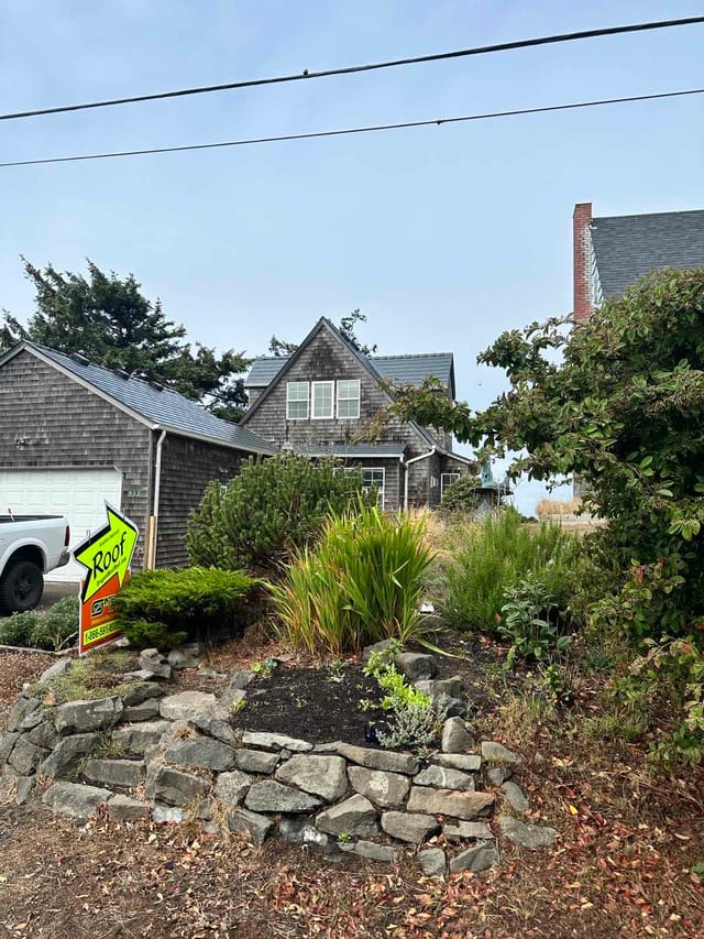 Deep Charcoal Interlock metal roof in Newport, OR