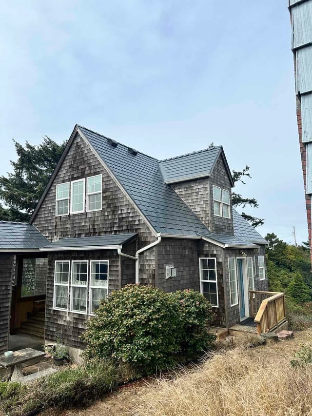 Deep Charcoal Interlock metal roof in Newport, OR
