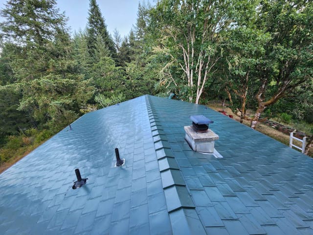 Hunter Green Interlock metal roof in Eugene, OR