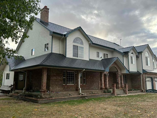 Black Interlock metal roof in Eugene, OR