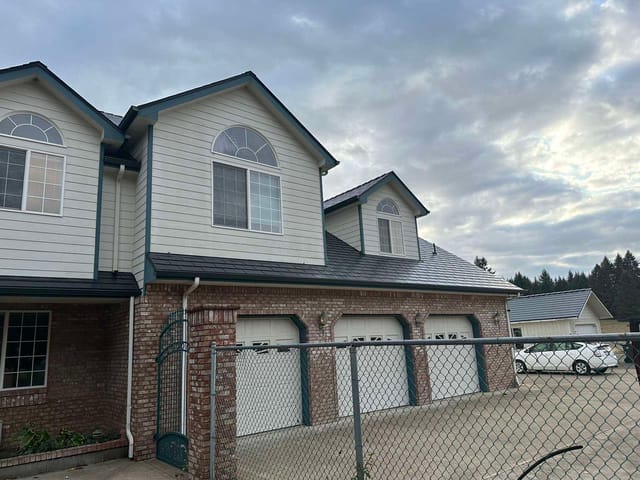 Black Interlock metal roof in Eugene, OR