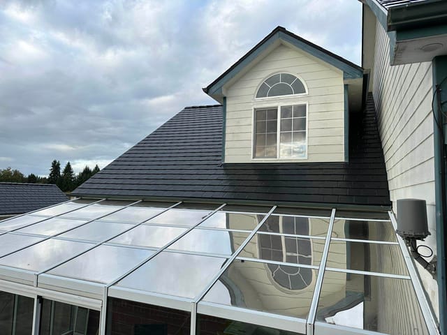 Black Interlock metal roof in Eugene, OR
