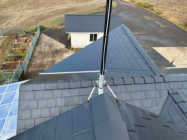 Black Interlock metal roof in Eugene, OR