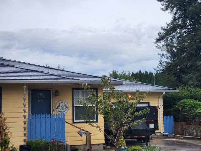 Deep Charcoal Interlock metal roof in Lebanon, OR