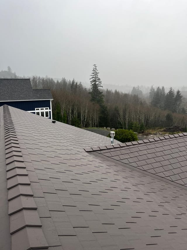 Tudor Brown Interlock metal roof in Seaside, OR