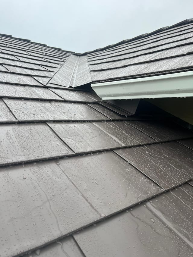 Tudor Brown Interlock metal roof in Seaside, OR
