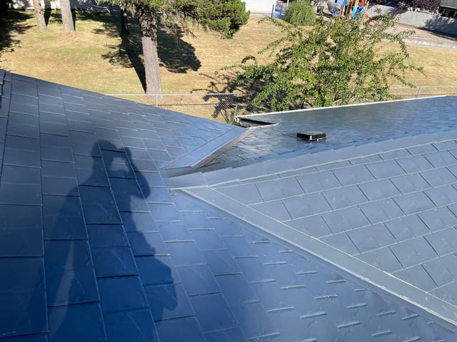Deep Charcoal Interlock metal roof in Florence, OR