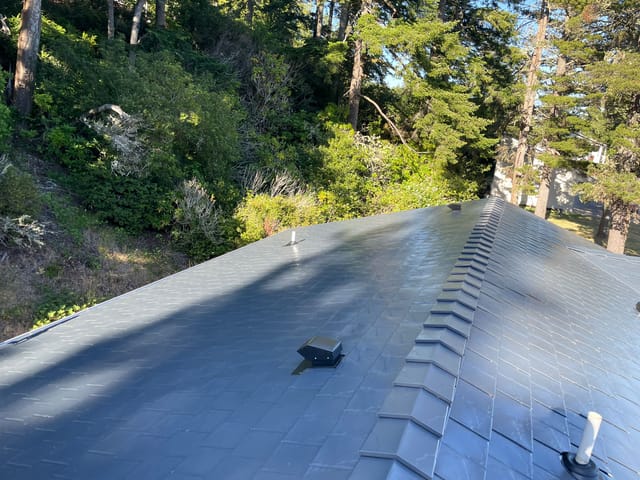 Deep Charcoal Interlock metal roof in Florence, OR