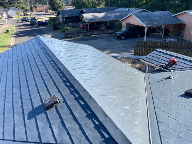Deep Charcoal Interlock metal roof in Florence, OR