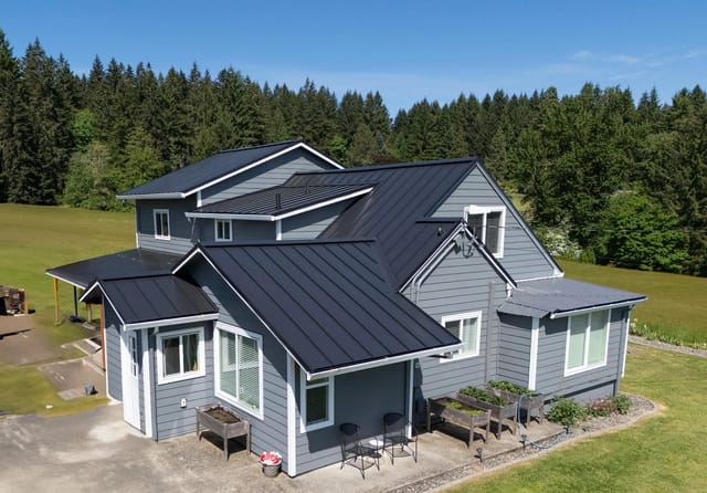 Black Interlock metal roof in Warren, OR