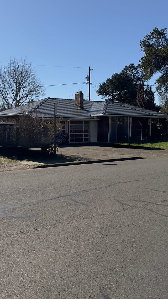 Deep Charcoal Interlock metal roof in Salem, OR
