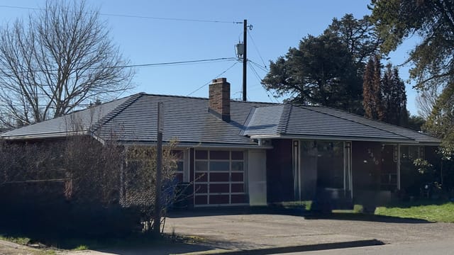 Deep Charcoal Interlock metal roof in Salem, OR