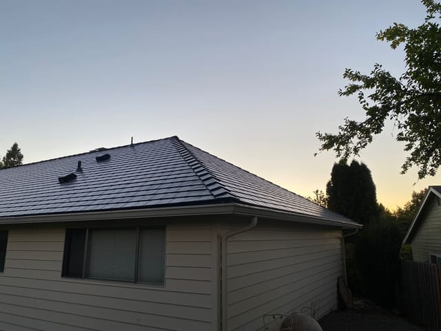 Black Interlock metal roof in Portland, OR