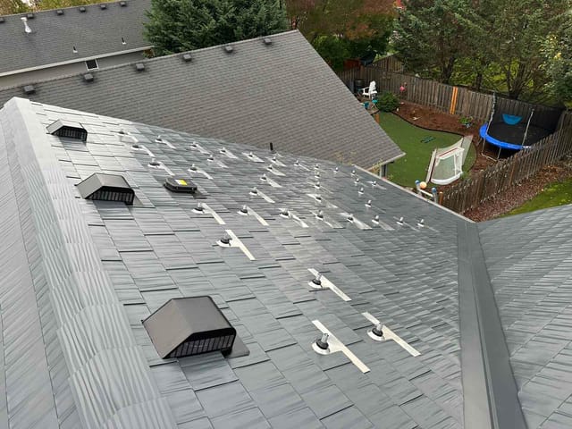 Deep Charcoal Interlock metal roof in Newberg, OR