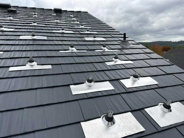 Deep Charcoal Interlock metal roof in Newberg, OR