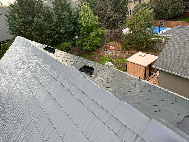 Deep Charcoal Interlock metal roof in Newberg, OR