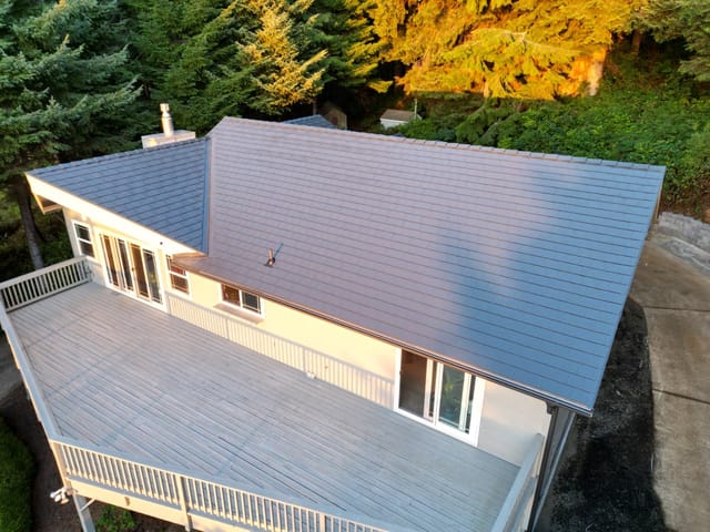Deep Charcoal Interlock metal roof in Yachats, OR