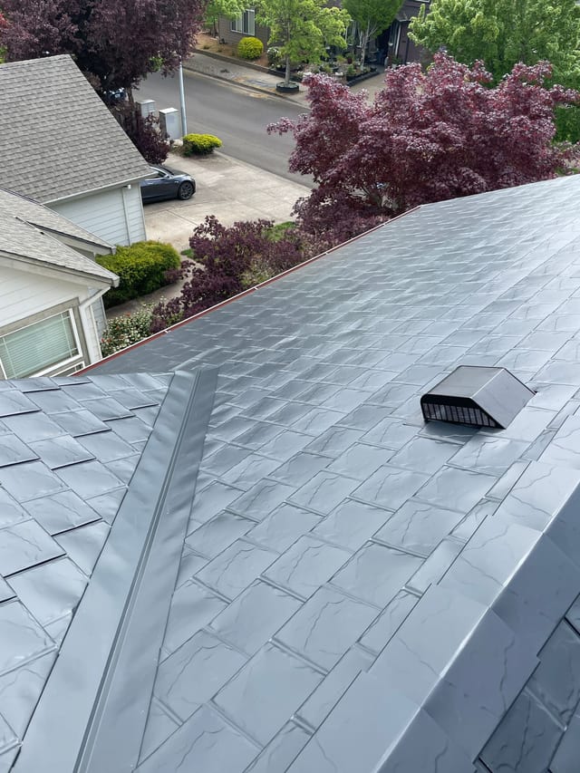 Black Interlock metal roof in Hillsboro, OR