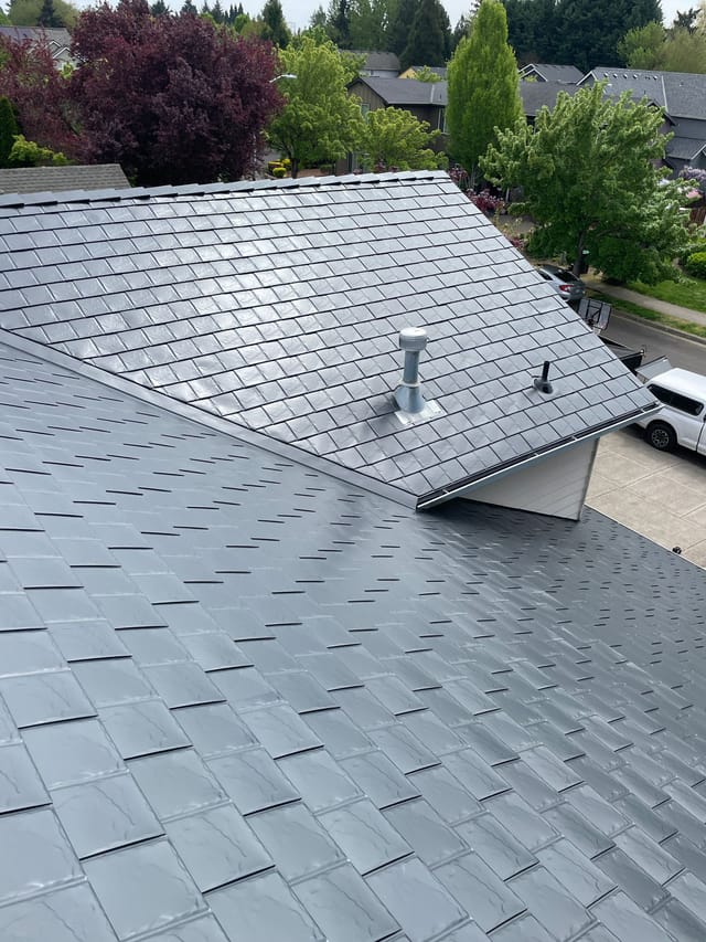 Black Interlock metal roof in Hillsboro, OR
