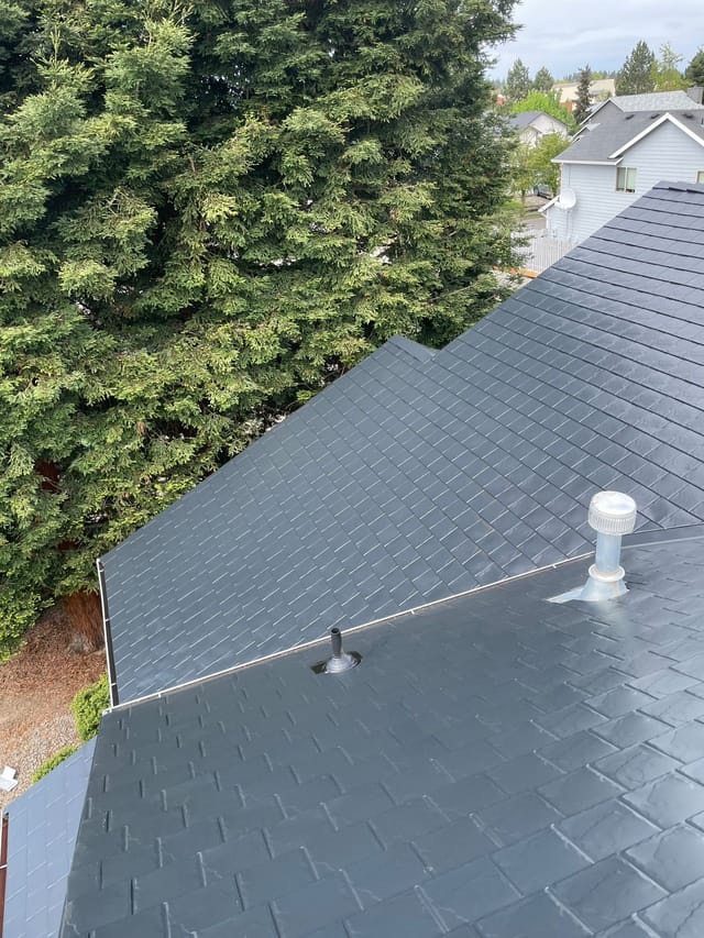 Black Interlock metal roof in Hillsboro, OR