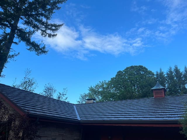 Tudor Brown Interlock metal roof in Portland, OR