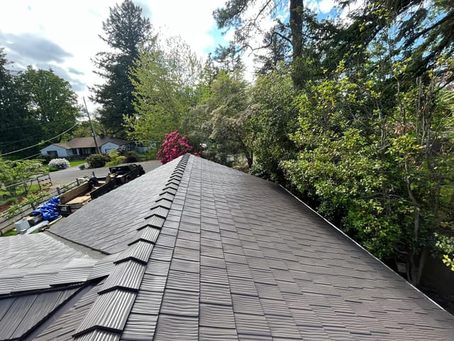 Tudor Brown Interlock metal roof in Portland, OR